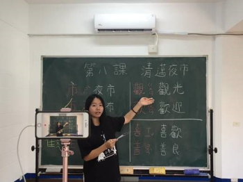 照片一：國北小泰陽服務隊錄製華語文教學影片。.png